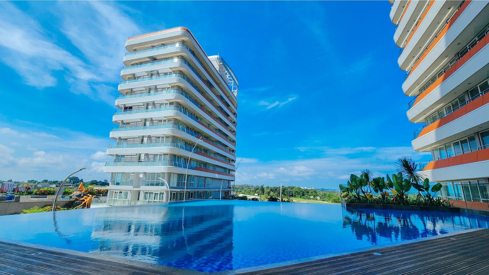 Rooftop infinity pool at Kalani Tower Batam overlooking the golf course